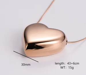 Detailed view of large 3D heart pendant on snake chain with 43+6cm length dimensions