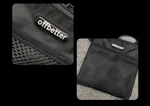 Detailed close-up of durable black nylon bag with mesh pocket and rubberized logo detail