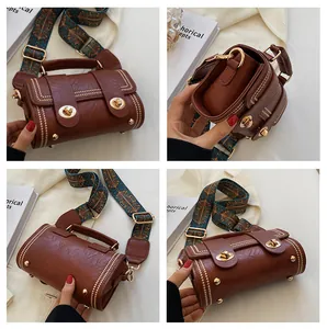 Multiple views of a vintage brown leather crossbody bag with dual golden locks and wide strap