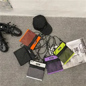 Mini nylon crossbody bags for women with mesh pocket and colorful sporty designs