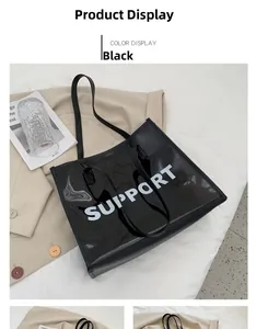 Flachbild einer schwarzen transparenten PVC-Tragetasche mit weißem SUPPORT-Textdruck