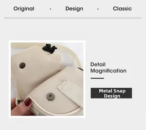 Dettaglio mini borsa a tracolla in nylon beige con chiusura magnetica e trama del tessuto