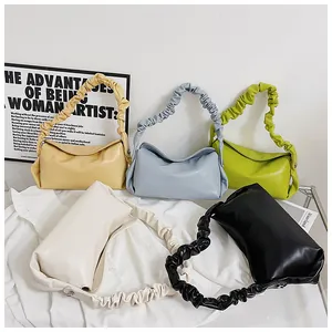 Collezione di borse a mano a pieghe in giallo, blu, verde, beige e nero moda