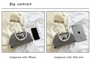 Size comparison of black rhinestone clutch with crystal bow and detachable chain