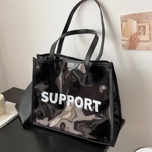 Μαύρη διάφανη τσάντα PVC με γράμματα Support και ασορτί μικρό εσωτερικό τσαντάκι