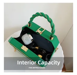 Internal capacity of green PU leather handbag showing space for phone and skincare