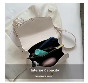 Internal capacity of the retro cream PU leather shoulder bag showing storage space