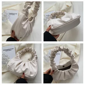 Detailed views of beige pleated cloud bag featuring soft PU leather and magnetic closure