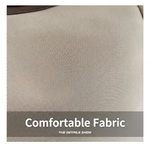 Dettaglio del resistente tessuto canvas kaki con trama fitta e bordo marrone