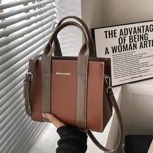 Minimalist large-capacity color-block tote bag with top handles and adjustable shoulder strap