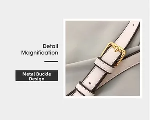 Dettaglio del cinturino in pelle bianca con fibbia in metallo dorato e cuciture di precisione