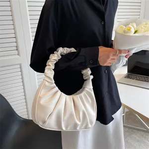 Elegant cream pleated cloud handbag for women with ruched handle and minimalist half-moon shape