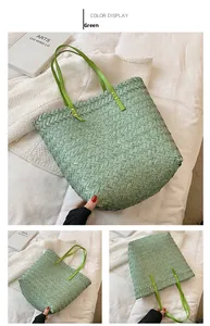 Close-up of green woven straw tote bag showing fine diagonal texture and metal rivets