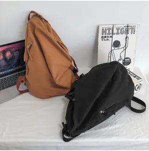Mochilas de lona minimalistas en negro y caramelo para estudiantes y uso diario