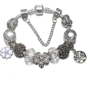 Floral DIY charm bracelet with silver snake chain and tree of life crystal beads