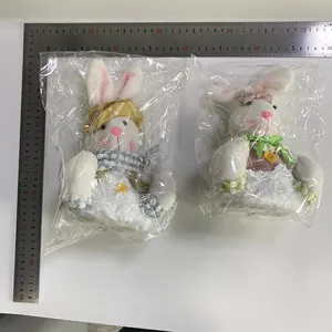 Easter glowing bunny plush toys measuring 25cm high with industrial scale ruler