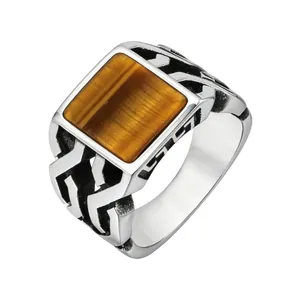 Men's vintage silver steel ring featuring a square tiger eye stone and Greek fret patterns