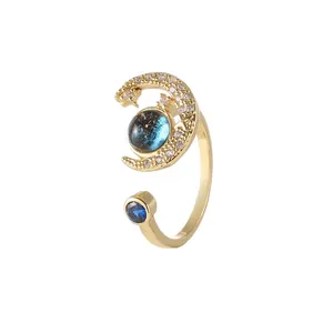Star and moon celestial open ring in gold finish with blue galaxy stone and pavé accents