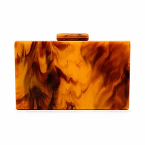 Elegante pochette da sera in acrilico marmorizzato ambra per matrimoni e cerimonie.