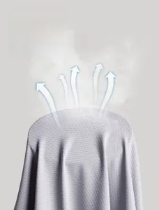 Macro view of mesh structure fabric showing breathability test on UPF50+ sun jacket