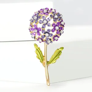 Detailed macro view of hydrangea brooch with purple enamel flowers and white rhinestones