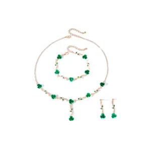 Detailed view of the green rose jewelry set featuring necklace bracelet and earrings