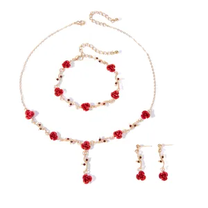 French vintage jewelry set including red rose necklace, bracelet, and earrings