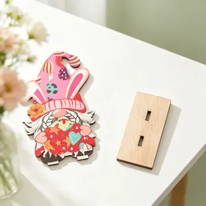 Detailed view of an Easter wooden gnome decoration with bunny ears and base stand