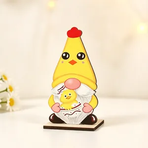 Detail of wooden Easter gnome with chicken costume and chick, rustic festive decoration