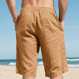 Detailed back view of khaki linen shorts featuring elastic waist and rear patch pocket