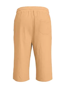 Detail of drawstring elastic waist and back pocket on breathable linen shorts