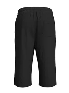 Close-up of black linen shorts featuring elastic waistband and back pocket detail