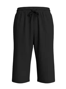 Detailed close-up of breathable linen shorts featuring elastic drawstring waist and side pockets