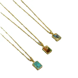 Three gold satellite chain necklaces with colorful geometric natural stone pendants