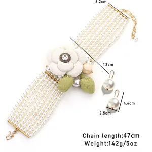 Elegant multi-layer pearl necklace set with large white camellia flower and pearl earrings