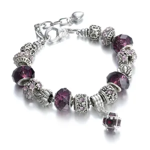 Silver alloy charm bracelet with deep purple faceted crystal beads and heart pendant