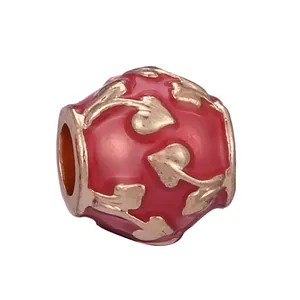 DIY red hollow bead charm with rose gold leaf pattern for custom bracelet jewelry