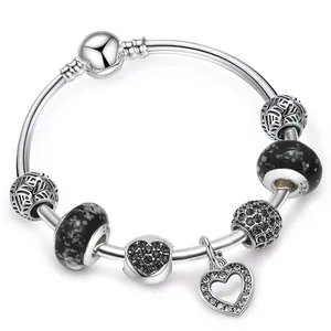 Bracciale in argento 925 con ciondoli a cuore e perle floreali in stile vintage