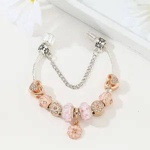 Elegantes Luxus-Perlenarmband mit rosa Glaskugeln und Herzanhängern auf Schlangenkette
