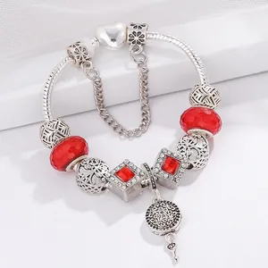 Pulsera de plata con abalorios de cristal rojo y colgante de árbol de la vida
