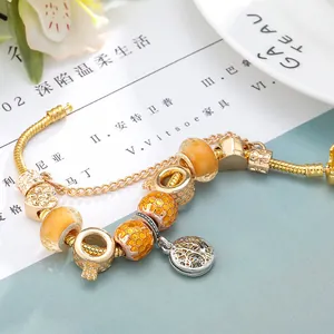 Exquisite gold charm bracelet with yellow crystal beads and honeycomb pendant for women