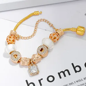 Luxury gold-plated heart bracelet with snake chain and cubic zirconia charms