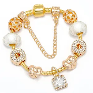Luxurious gold-plated snake chain bracelet with sparkling heart charms and crystal beads