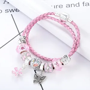 Pink double-layer braided leather bracelet with floral beads and butterfly charms