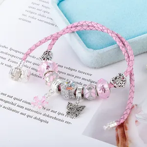 Pink double-layer leather charm bracelet with silver butterfly and flower pendants