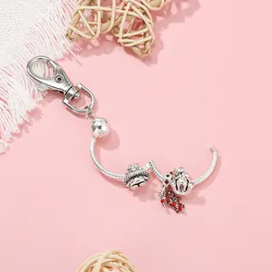 Details von Schlangenkette Schlüsselanhänger mit Lebkuchenmann und Perlenanhänger