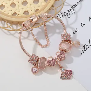 Rose gold snake chain bracelet with pink glass beads and luxury crown heart charms