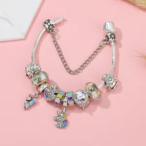 Colorful unicorn charm bracelet with silver snake chain and pink enamel beads