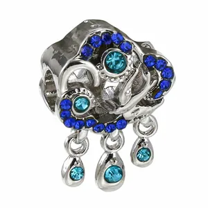 Silver charm featuring a blue crystal pave cloud design with three dangling raindrops