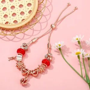Bracciale a corona oro rosa con perline di cristallo rosso e catena regolabile
